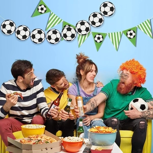 Soccer party decoration set featuring football banners and green triangular pennant flags