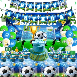 Detail of football birthday party decorations with banner, cake toppers and balloons