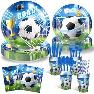 Close-up of world cup soccer party tableware set including paper plates and gold cups