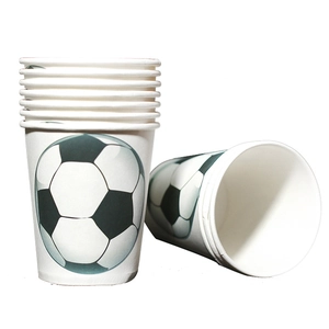 Close-up of disposable paper cups with classic black and white soccer ball pattern design