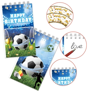 Detailed view of spiral notebooks with soccer and construction vehicle themed covers