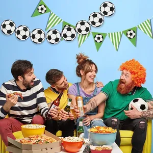 Soccer party decoration set with football banners and friends celebrating on the sofa