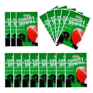 Green American football party favor bags with Touch Down text and football graphics