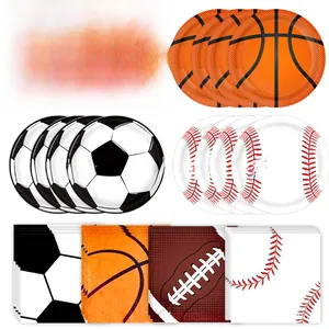 Close-up of disposable paper plates and napkins with sports balls patterns for parties