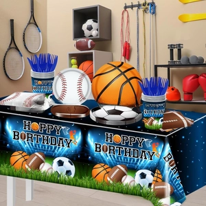 Detailed view of sports theme party set with ball-shaped plates and themed cups