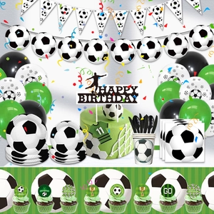 Detailed view of soccer birthday party set with balloons, plates, and cake toppers