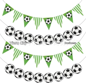 Detail of soccer themed party banners including green triangular pennants and ball garlands