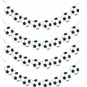Soccer theme party banner set with multiple black and white football patterns decorations