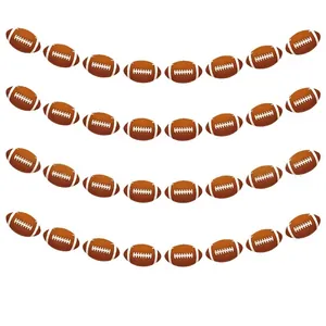 Detail of American football themed banners with brown oval cutouts and white stitching