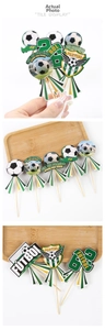 Detailed view of football theme cupcake toppers with soccer ball and cleats designs