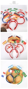 Close-up of World Cup headbands with sequined national flags and spring attachments