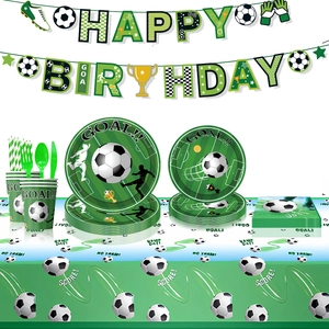 Soccer themed birthday party supplies with Happy Birthday banner, plates, cups and tableware