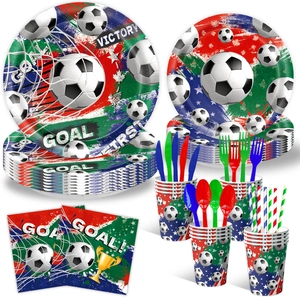 Detail showing soccer theme party plates, cups, napkins, and colorful cutlery set