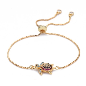 Adjustable golden box chain bracelet featuring a turtle charm with colorful zircon stones