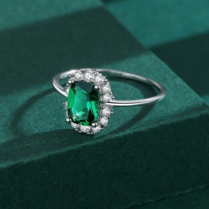 Vintage S925 sterling silver ring with emerald cut gemstone and white diamond halo