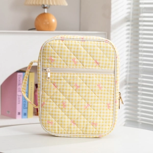 Quilted yellow checkered book storage bag with zipper and handle for travel