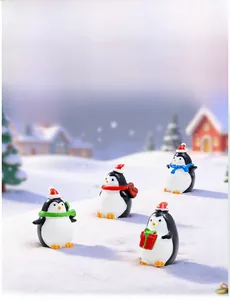 Set of four Christmas penguin figurines with red hats and scarves in a winter snow scene