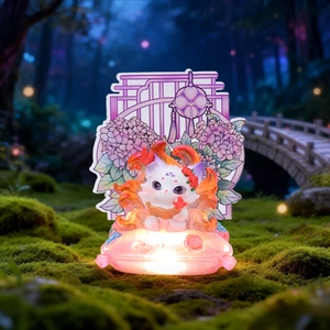 Detail of glowing white fox figurine with purple eyes on a luminous pink base in forest
