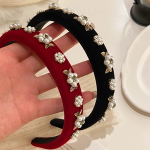 Elegant velvet flower headbands with pearls and gold leaf accents for vintage styling