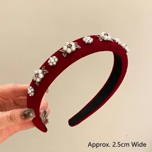 Detail of red velvet headband with white pearls and gold leaves, width 2.5cm