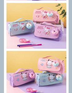 Detailed view of pastel multi-layer stationery bags with cute character prints and charms