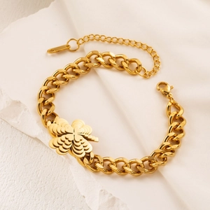 Chunky gold titanium steel bracelet with layered clover pendant and curb chain links