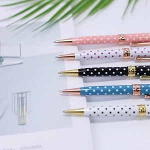 Polka dot metal ballpoint pens in multiple colors with elegant rose gold accents