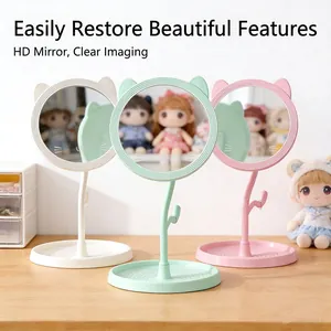 Cute cat-ear makeup mirror with storage base in white, green, and pink colors