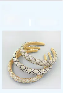 Detail of diamond-studded headbands with non-slip velvet lining and lattice texture