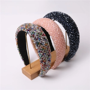Chic padded crystal headbands in colorful, pink and navy blue for luxury hair styling