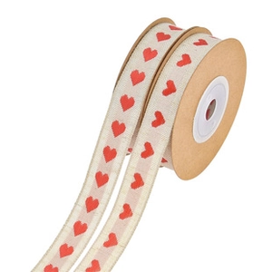 Detailed macro of heart pattern woven ribbon roll for wedding gift packaging