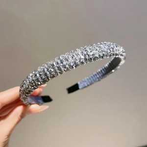 Detail of four-row crystal headband with faceted silver beads and protective rubber tips