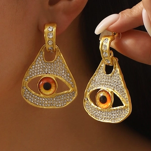 Boucles d'oreilles vintage style français avec oeil protecteur et strass étincelants