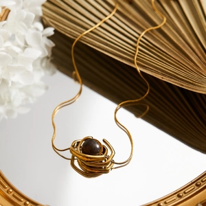French style gold geometric pendant necklace with tiger eye stone and snake chain