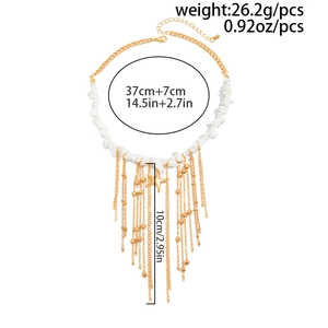 Detail view of gold tassel necklace with white stone beads and star pendant size specs