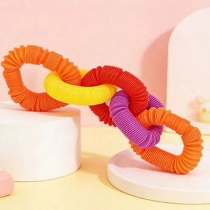 Colorful sensory pop tubes for kids flexible plastic stretch pipe toys on geometric stands