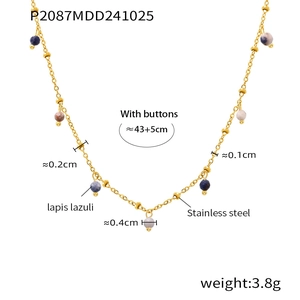 Detail of 18K gold-plated stainless steel necklace with lapis lazuli and colored beads