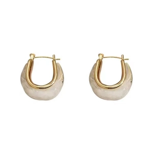 Vintage U-shaped amber resin earrings with polished gold-tone metal frames