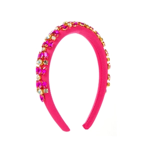 Detail of rose pink padded headband with intricate pink crystal floral embellishments