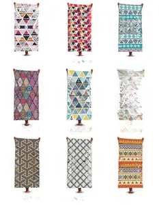Detailed grid of nine quick-dry beach towels with geometric and bohemian patterns