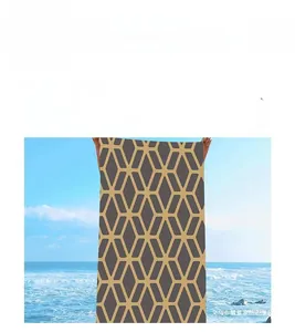 Macro detail of geometric honeycomb print on soft quick-dry beach towel fabric
