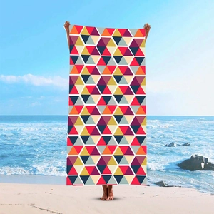 Quick-dry microfiber beach towel with vibrant colorful geometric hex pattern for women
