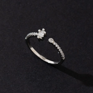 Detail of adjustable silver ring with rectangular crystal and micro-pave setting