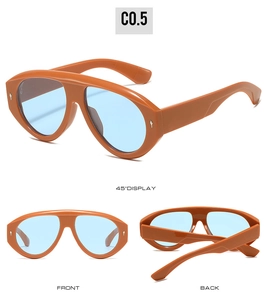 Vues détaillées de lunettes de soleil vintage orange avec verres bleus et rivets losanges