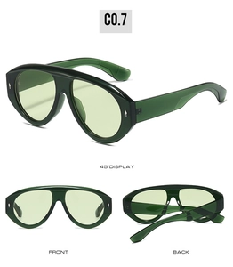 Vue détaillée des lunettes pilote oversize avec monture verte et accents en métal