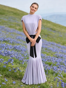 Elegant purple waist-cutout dress with black bow and pleated fishtail hem for summer