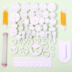 33-piece fondant cake decorating tool set with cutters, embossers, and rolling pin