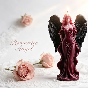 Goddess angel wings scented candle in deep burgundy and black wings for home decor