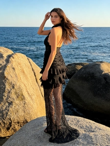 Elegant black lace V-neck halter dress with sheer floral hem for evening party