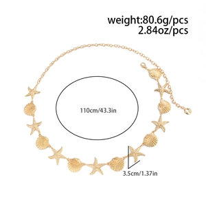 Detailed view of gold body chain featuring starfish and shell charms on 110cm metal links